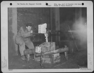 Consolidated > Gunnery Training At The 8Th Bomber Command Air Base Was Constant And Careful.  Here, M/Sgt. Robert M. Baylis, Mansfield, Wash., Gunner, Improves His Skill In The Operation Of The .50 Caliber Machine Gun.