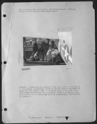 Thumbnail for Consolidated > England - Unexciting But Essential Work, And Plenty Of It, Had To Be Done Before Paratroopers Jumped On The Far Side Of The Rhine To Begin The 'Big Heave'.  Men - 24 Hours Ahead Of The Jump Time, Load Aboard A Consolidated B-24 Libertaors Bundles Of Weapo