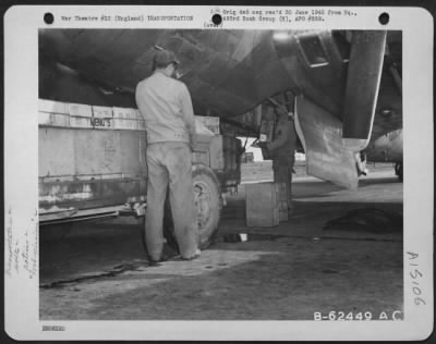 Thumbnail for Consolidated > Personnel Of The 493Rd Bomb Group Loading Food Supplies Into The Boeing B-17 "Flying Fortress" "Bomb Bay Of Blues" Preparatory To "Food Mission" Flight.  England, 7 April 1945.