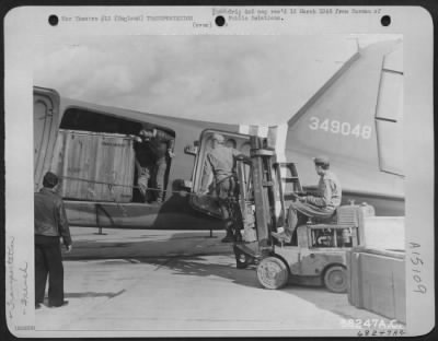 Thumbnail for Consolidated > Gis Who Have Handled Hundreds Of Tons Of Air Technical Service Command Air Freight Shipments And The French Transport Crewmen Work Side By Side To Load A Huge Thunderbolt Engine Into A Douglas C-47.  C-47S Transferred To The French Air Corps And Manned By