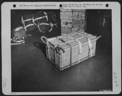 Consolidated > Qm Troops Of The 490Th Qm Depot And The 101St Airborne Division Try Out The British Pannier Basket For Delivering Supplies To Troops On The Ground.  This Photo Shows A Loaded Pannier Basket With Its Harness Ready For Attaching To The Parachute.  Berks, En