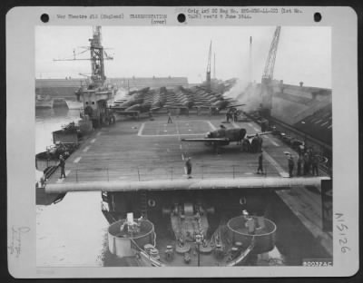 Thumbnail for Consolidated > North American P-51S Are Loaded Onto The Deck Of A British Aircraft Carrier For Delivery To Other American Ports In The Eto.  Liverpool, England, 1 February 1944.