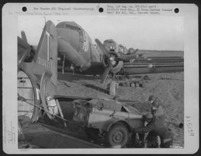 Thumbnail for Consolidated > Equipment Is Loaded Aboard Douglas C-47S At A 9Th Troop Carrier Command Base In England.  6 June 1944.