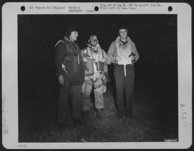 Consolidated > These 3 Officers, Attached To A Parachute Battalion, Await Take-Off Time From Their Base In England For The Invasion Of Europe.  They Are, Left To Right: Major Howard W. Cannon Of St. George, Utah, Co-Pilot Of The Carrier; Colonel Robert S. Wolverton Of E