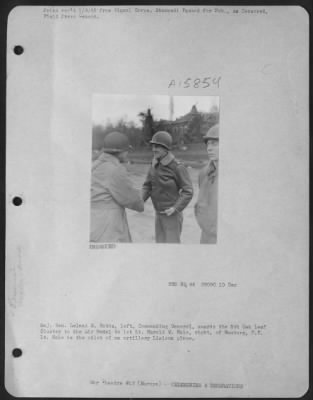 Thumbnail for General > Major General Leland S. Hobbs, Left, Commanding General, Awards The 5Th Oak Leaf Cluster To The Air Medal To 1St Lt. Harold W. Hale, Right, Of Hamburg, N.Y.  Lt. Hale Is The Pilot Of An Artillery Liaison Plane.