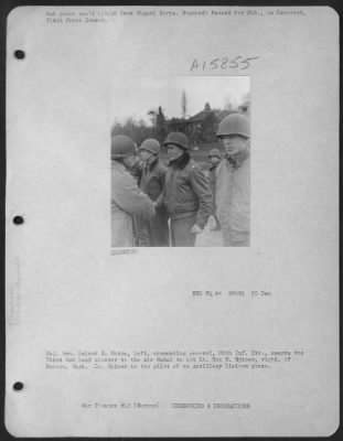 Thumbnail for General > Major General Leland S. Hobbs, Left, Commanding General 30Th Inf. Div., Awards The 3Rd Oak Leaf Cluster To The Air Medal To 1St Lt. Bob M. Spicer, Right, Of Renton, Wash.  Lt. Spicer Is The Pilot Of An Artillery Liaison Plane.