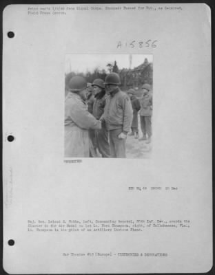 Thumbnail for General > Major General Leland S. Hobbs, Left, Commanding General 30Th Inf. Div., Awards The Cluster To The Air Medal To 1St Ford Thompson, Right, Of Tallahassee, Fla.  Lt. Thompson Is The Pilot Of An Artillery Liaison Plane.