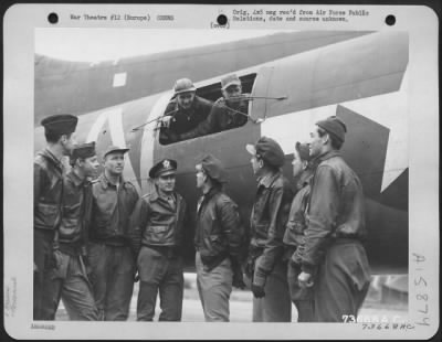 Thumbnail for General > Crew Members Of A Boeing B-17 "Flying Fortress" Discuss The Hazardous Flight Home From A Mission Over Frankfurt, Germany During Which Both Engines Were Knocked Out By Enemy Flak.  Crew Members Are: Sgt. David Cameron, Boothwin, Pa.; S/Sgt. Ruben Kisner, D