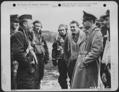 Thumbnail for General > Brig. Gen. Leon W. Johnson Talks With Crew Members After Their Return From A Raid On Berlin, Germany.  Europe.