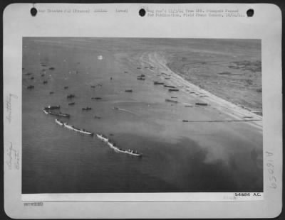 Consolidated > American Liberty shiops were deliberately scuttled off the beachheads in France to provide makeshift breakwaters during the early days of the invasion, it can now be revealed. Photographed from a 9th Air force Martin B-26 Marauder, the scene