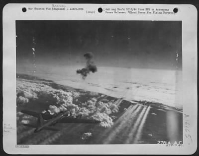 Thumbnail for Boeing > With their contrails blending into the clouds below them, these Flying ofrtresses of the U.S. Army 9th Air force head out over Europe, to blast Nazi installations deep inside Germany. The large black burst in the center of the photo is thought to be