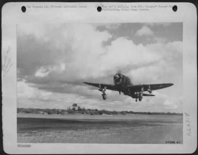 Thumbnail for Republic > A 9th Air force Republic P-47 Thunderbolt Fighter-Bomber, a 500-pound bomb nestled under each wing, takes off on a sunny day, a rare event in France, as the wet winter sets in, to bomb targets in Germany.