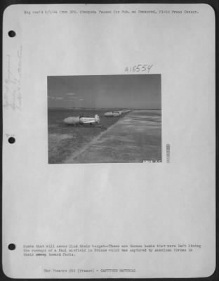 General > Bombs that will never find their target--These are German bombs that were left lining the runways of a Nazi airfield in France which was captured by American forces in their sweep toward Paris.