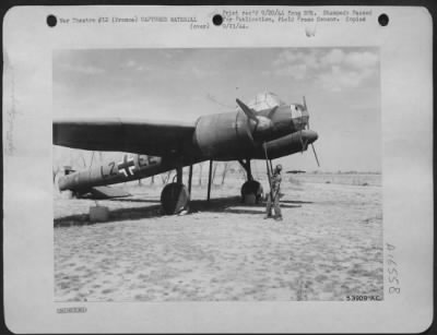 General > An American soldier tries to spin the "prop"of this exact Plywood replica of a German JU-88 Bomber, found near the town of Salon, in Southern France.