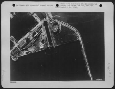 Thumbnail for Consolidated > Boom Depot At Cherbourg, France.   Annotations Are: 1. Two Anti-Torpedo Nets Laid Out On The Ground.  These Nets Are Steel Mesh, And Some 50 Feet In Depth, And Supported By Floats At Intervals Of Six Feet, And By Buoys At Intervals Of 200 To 400 Feet.  2.