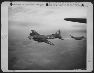 Thumbnail for Boeing > Boeing B-17 Flying Fortresses Of The 91St Bomb Group, 8Th Air Force, Are Shown Over The Patchwork Landscape Of France Enroute To Their Target Of The Day - Tours.  5 January 1944.  Altitude 20,300 Feet.