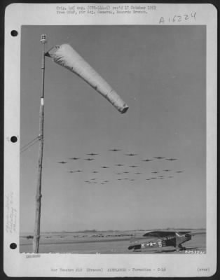 Thumbnail for Curtiss > Curtiss C-46 Commandos Of The 9Th Troop Carrier Command Hold Their Formation As They Pass Over An Air Base Somewhere In France.  21 March 1945.