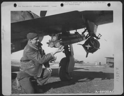 Thumbnail for General > Final Check And Inspection Of Rocket Launcher Are Made By A Ground Crewman.  The Rocket Has Three Sections: Fuse, War-Head And Motor.  The Acceleration Of Projectile Opens Six Fins That Are Folded Into Body Of Rocket Before Projectile.  France.