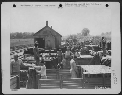 Thumbnail for General > Enlisted Men Load Crated Bombs Onto Trucks At A Railroad Station In France.