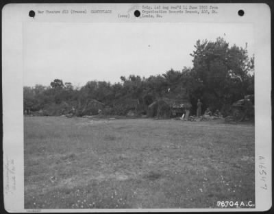 General > Camouflaged Equipment Of The 834Th Engineer Aviation Battalion Somewhere Near Normandy Beach, France.