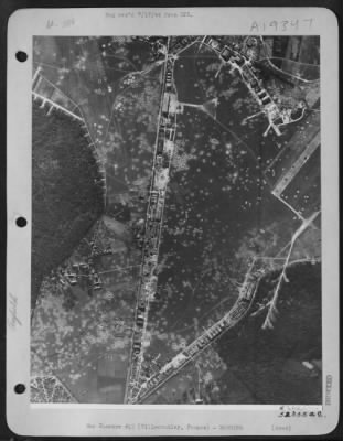 Thumbnail for Villacoublay > PARISIAN AIRDROME-Villacoublay airport and repair depot of the southwest edge of Paris has been repeatedly attacked by U.S. 8th AF heavy bombers. This reconnaissance photo taken after the 25 June 44 attack reveals the devastation to hangars, shops