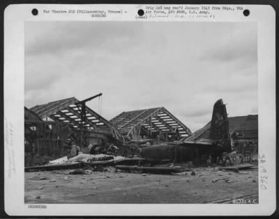 Thumbnail for Villacoublay > This German Ju 88 Plane Was In The Process Of Being Re-Engineered When American Bombs Fell On The Airdrome And Repair Depot Near Villacoublay, France.  Note The Chain Hoist Suspended From The Boom And The New Engine Which Was Ready For Installation.  1 Se