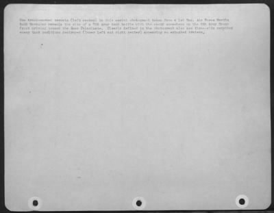 Consolidated > The track-marked terrain (left center) in this aerial photograph taken from a 1st Tac. Air Force Martin B-26 Marauder reveals the site of a 7th Army tank battle with the enemy somewhere on the 6th Army Group front driving toward the Saar Palatinate.