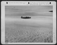 Consolidated B-24 Liberators of the 392nd Bomb Group on a raid over Bremen, Germany, are plagued by a heavy flak barrage, 16 December 1943. - Page 1