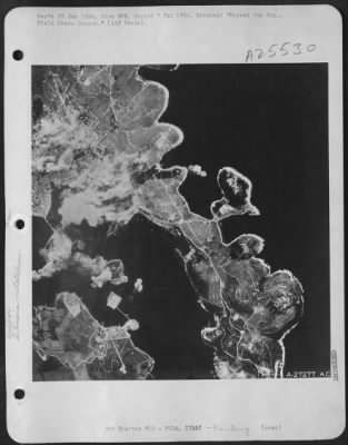 Thumbnail for Consolidated > Smoke rises from fires and explosions in the target area. Many fires were started by the bombing, according to crews of the B-17s