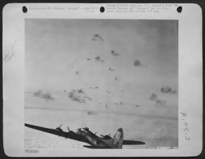 Thumbnail for Flak > Boeing B-17 Flying Fortress, flying through one of Hun's Heaviest AA defenses. (Dec 16, 43). 95th Bomb Group.