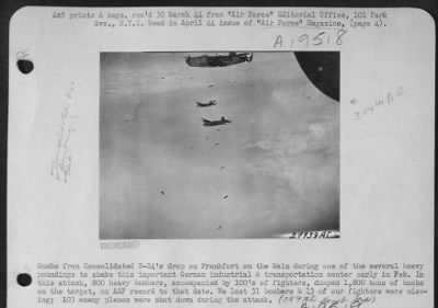 Thumbnail for Flak > Bombs from Consolidated B-24's drop on Frankfort on the Main during one of the several heavy poundings to shake this important German industrial & transportation center early in Feb. In this attack, 800 heavy bombers, accompanied by 100's of fighters