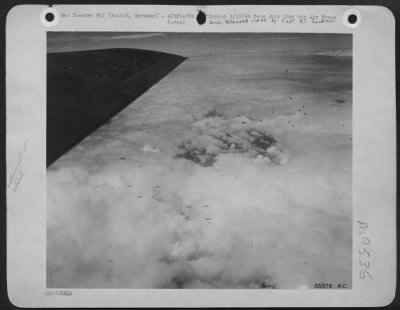 Thumbnail for Flak > Boeing B-17 Flying Fortresses carry out attack on Munich M/Y Factory, Germany, through cloud.