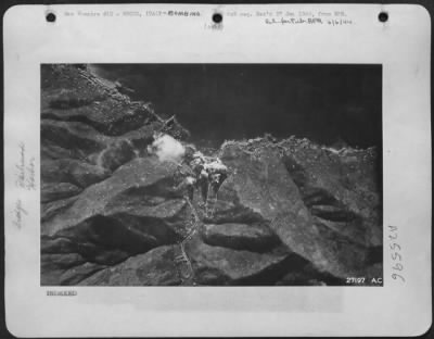 Consolidated > Marauders strike home, as the railroad viaduct at RECCO, Italy, south of Genoa, is hammered by USAAF medium bombers. (Picture shows the railroad viaduct target as it appeared to reconnaissance planes before the mission, while later the precision