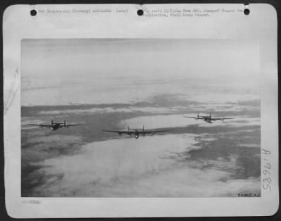 Consolidated > Three Consolidated B-24 Liberators of the U.S. 8th Air Force set the stage for this picture high over Germany as they roared to attack military targets 11/5/44.