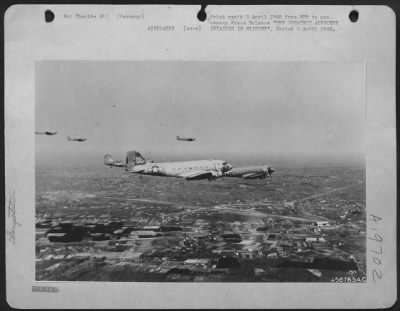 Douglas > THE GREATEST AIRBORNE INVASION IN HISTORY.---These transports, part of a force of 1500 transports and gliders, are flying toward the Rhine to drop paratroops in advance of the Rhine-crossing ground troops moving toward the Ruhr. This picture