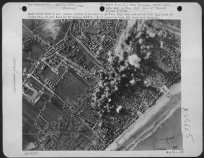 Thumbnail for Consolidated > East coast raod & rail center looked like this on 30 Dec. 1943 when saturated with 74.5 tons of bombs from 21,500 feet by 25 Boeing B-17's. In 2 previous days 631 tons were dropped.