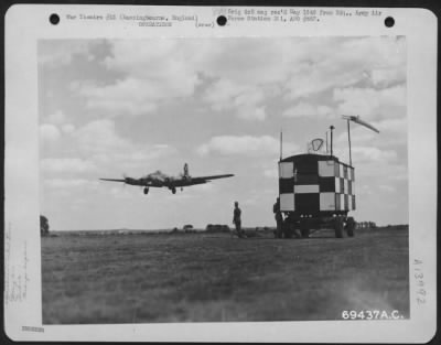 General > A Boeing B-17 "Flying Fortress" Of The 91St Bomb Group Comes In For A Landing At Its Base In Bassingbourne, England.  Note The Mobile Control Tower To The Right.  20 August 1944.