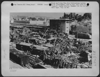 Thumbnail for Consolidated > Aftermath photo shows how railroad yards at Rome, Italy were devastated by accurate bombing.