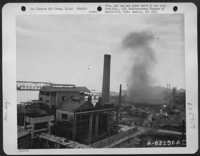 Thumbnail for Consolidated > Bomb damage to a manufacturing center north of Rome, Italy.