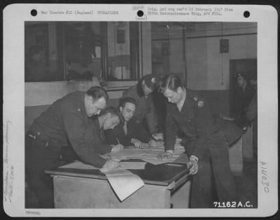 Thumbnail for General > At An 8Th Air Force Base In England Officers Of The 379Th Bomb Group Make Plans For Another Raid On Enemy Installations Somewhere In Europe.  12 March 1945.