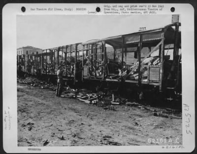 Thumbnail for Consolidated > Bomb damage to rail cars north of Rome, Italy.