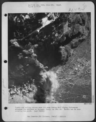 Thumbnail for Consolidated > Tracks And Rolling Stocks Were Hit When Boeing B-17 Flying Fortresses Attacked The Railyard At Bolzano, Italy, On Dec. 26.  Bursts Can Be Seen Covering The Yards.  Aaf Photo.