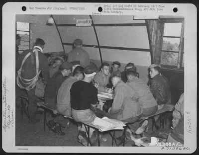 Thumbnail for General > Crew Of The 390Th Bomb Group Who Have Just Returned From Raids Over Stuttgart And Strasbourg, Germany, Are Interrogated At Their 8Th Air Force Base In England.  6 September 1943.