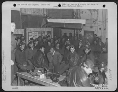 General > After Returning To Their 9Th Air Force Base In England From A Mission Over Enemy Territory, Men Of The 410Th Bomb Group Give An Account Of Their Attack To The Interrogation Officer.