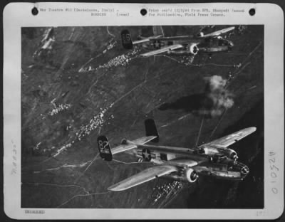 Consolidated > 'We Got It', Cried The Bombardier Over The Interphone.  And So They Did As The North American B-25 Mitchells Of Tactical Air Force Came Off Their Target At Castelnova Railway Bridge, 60 Miles Northeast Of Verona, Italy, Where They Dropped An Exceptionally