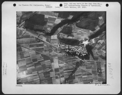 Thumbnail for Consolidated > During - A Heavy Concentration Of Bombs Dropped By Martin B-26 Marauders Of The 12Th Af Burst On Fuel And Storage Dumps Near Cellecchio, Italy, On 7 July 1944.  Terrific Explosions Resulting From Bomb Hits Rocked The Attacking Planes And Many Of The Marau