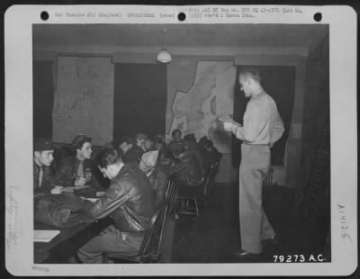 General > Capt. Ralph Hosman Of Western Springs, Ill., Group Navigation Officer At Bassingbourne, England, Explains The Route Of A Pending Mission To Navigators Before An Operation Over Enemy Territory.  20 June 1943.