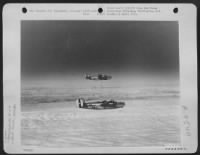 Thumbnail for Bursts Of Deadly Flak Explode Dangerously Close To Consolidated B-24S Of The 93Rd Bomb Group During A Mission Over Augsburg, Germany.  1 March 1945. - Page 5