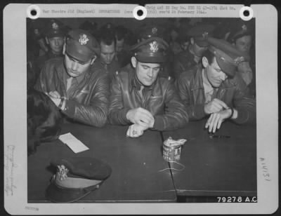 Thumbnail for General > Crew Members Of Boeing B-17S Operating From Bassingbourne, England Synchronize Their Watches During Briefing.  20 June 1943.