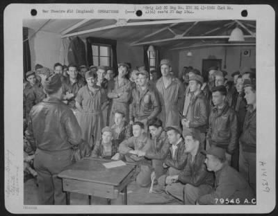 General > Boeing B-17 Gunners Of The 360Th Bomb Squadron, 303Rd Bomb Group Are Briefed By Lt. Kenneth W. Davey, Gunnery Officer From Webster Grove, Missouri, Before Take-Off On A Mission From Their Base At Molesworth, England.